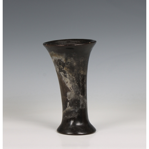 319 - A studio pottery trumpet vase 7½in. (19cm.)  high.