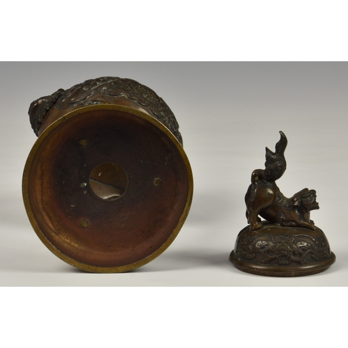 37 - A Chinese bronze censor probably 20th century, pull-off domed cover with foo dog finial, the two res... 