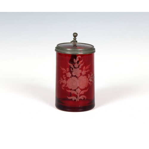 396 - An early 20th Century ruby glass tankard Likely Austrian, etched with a floral design, the handle su... 