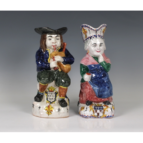 473 - A pair of Falaise ceramic figural jugs of a man playing the bag pipes and a woman, the woman marked ... 