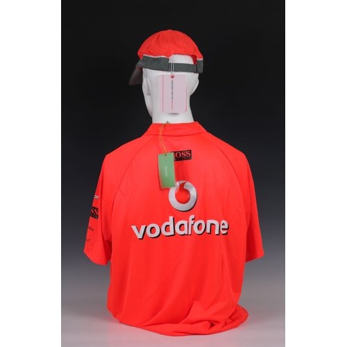 483 - A Vodafone McLaren Mercedes official F1 team bright orange Hugo Boss XL polo / T-Shirt, signed below... 