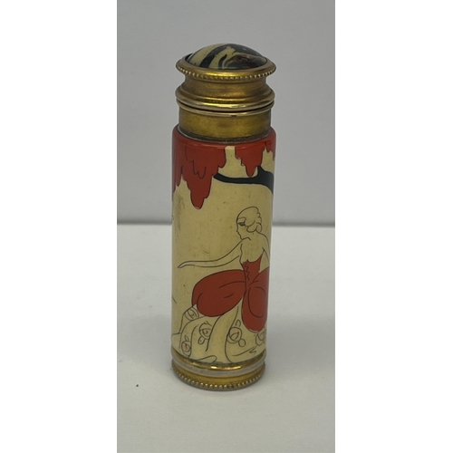 520 - An Art Nouveau gilt metal and enamel screw top vessel decorated with a female figure under a tree wi... 