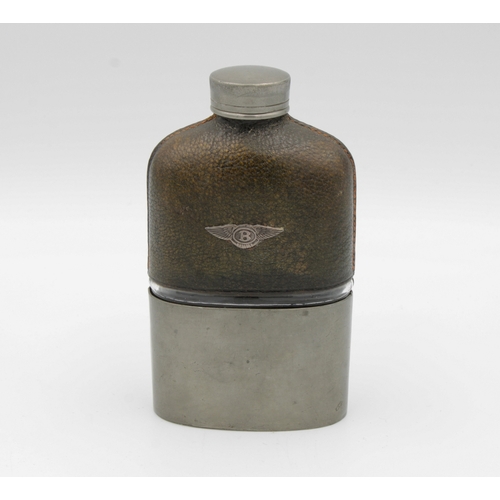 536 - A mid 20th century Bentley branded pewter and green leather mounted screw top hip flask with applied... 