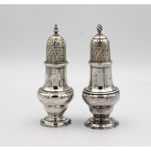 547 - Two early George III silver baluster pepper pots John Delmester, London, 1761 & 1764, of similar des... 