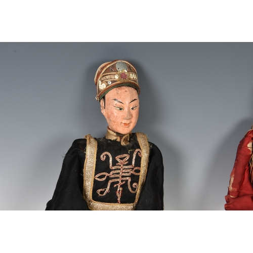 56 - Two antique Chinese opera dolls, carved wood with painted gesso features probably early 20th century... 