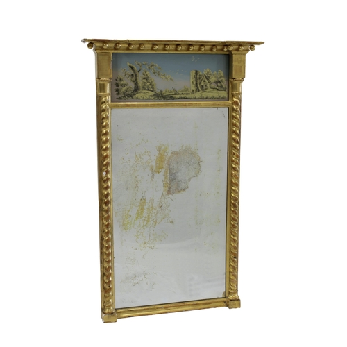 565 - A Regency style giltwood pier mirror the glass plate surmounted by a wide cornice with shot decorati... 