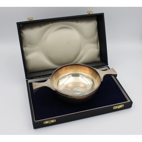 574 - Breweriana /  Bucktrout Guernsey interest - A cased silver presentation Quaich Richard Lawton Ltd, L... 