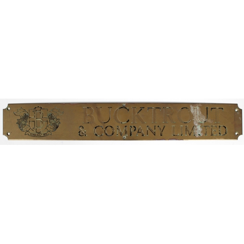 576 - Breweriana / Bucktrout Guernsey interest - A Brass 'BUCKTROUT & COMPANY LIMITED' door plaque 51.8cm.... 