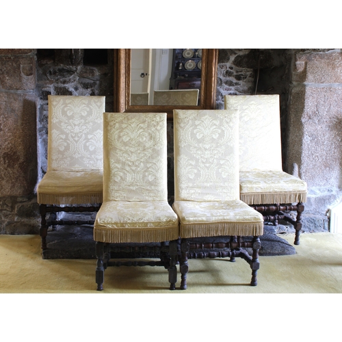 626 - A matched set of four 18th century & later stained beech and fruitwood chairs Upholstered in a flora... 