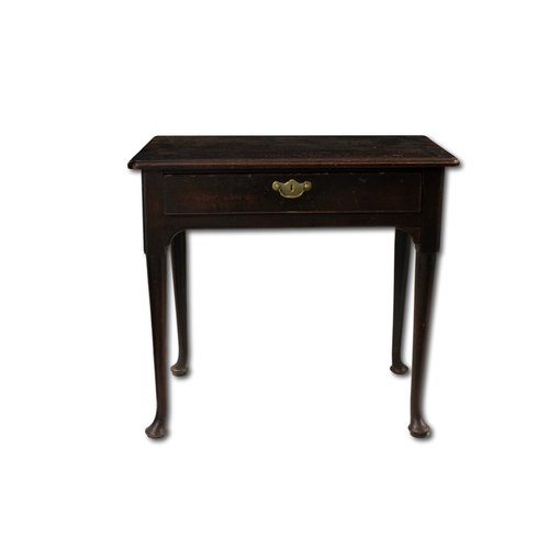 644 - A Georgian mahogany side table with a single drawer slightly sweeping legs and pad feet, 76.3 x 43.8... 