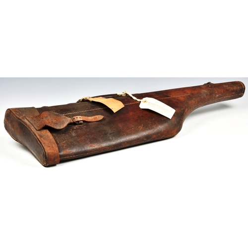 99 - A Brown leather leg of mutton gun case.