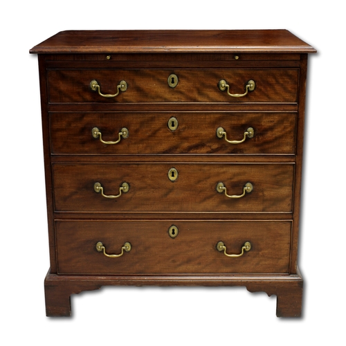 648 - A Georgian mahogany bachelors chest of drawers The moulded rectangular top above a brush slide and f... 