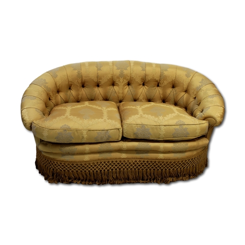 660 - A pair of 20th Century tub sofas, Upholstered in a gold/champagne foliate fabric, approx. 85cm x 160... 