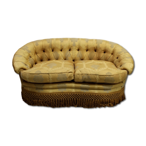 660 - A pair of 20th Century tub sofas, Upholstered in a gold/champagne foliate fabric, approx. 85cm x 160... 