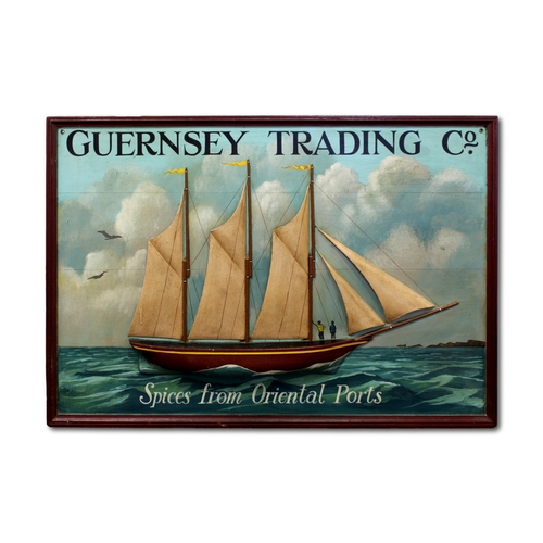 19 - A rare 'GUERNSEY TRADING Co' painted wooden advertising sign, with applied wooden ship in relief to ... 