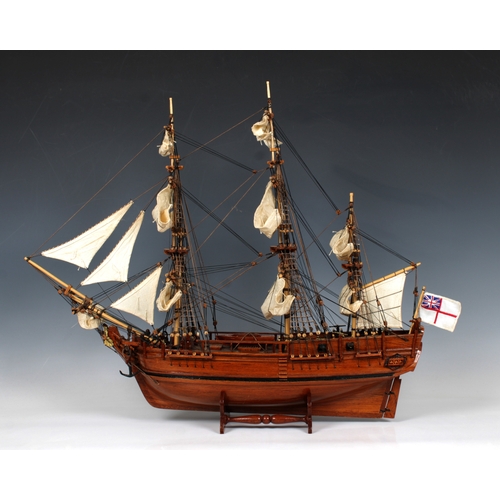 28 - A wooden H.M.S Bounty -1787- model, having wooden decks and detailed fixtures and fittings, linen sa... 