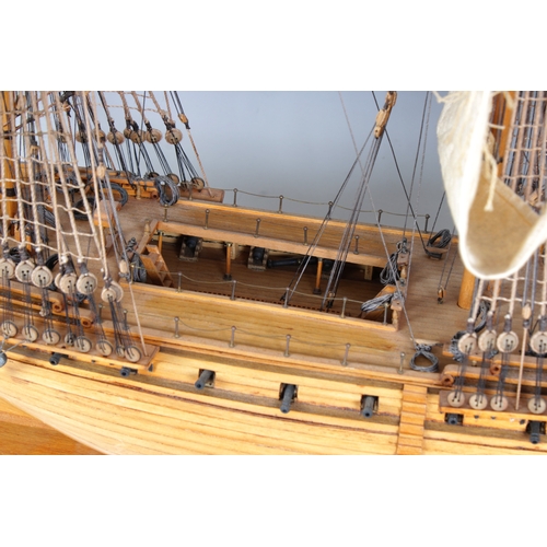 29 - A model of H.M.S. Unicorn, the British 32 gun frigate, of wooden construction, with unicorn figurehe... 