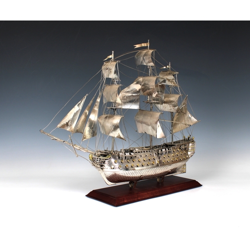 31 - An Italian silver & parcel gilt model of H.M.S Victory 1765, post 1968 mark for Florence, also stamp... 