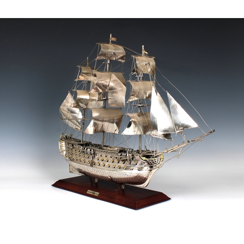 31 - An Italian silver & parcel gilt model of H.M.S Victory 1765, post 1968 mark for Florence, also stamp... 