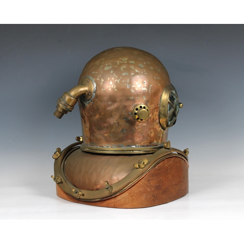 59 - A Chinese or similar 12-bolt diving helmet, copper and brass, of characteristic form with beaten bon... 