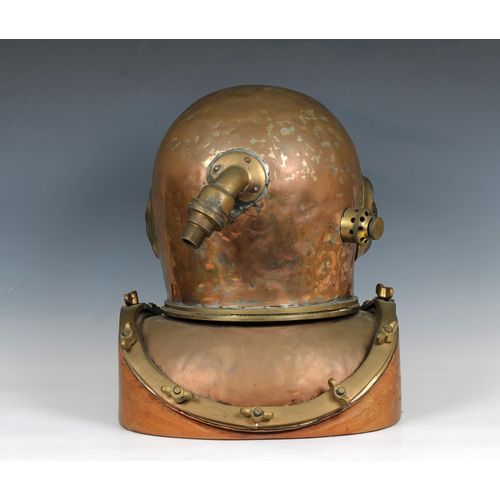 59 - A Chinese or similar 12-bolt diving helmet, copper and brass, of characteristic form with beaten bon... 