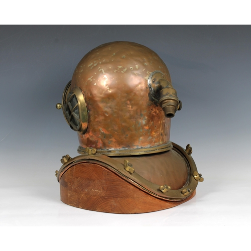 59 - A Chinese or similar 12-bolt diving helmet, copper and brass, of characteristic form with beaten bon... 