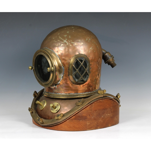 59 - A Chinese or similar 12-bolt diving helmet, copper and brass, of characteristic form with beaten bon... 