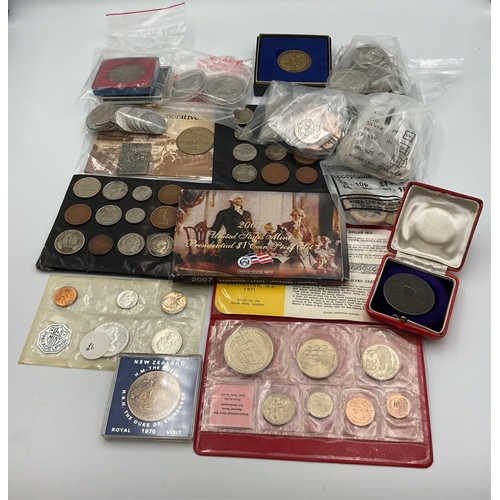 A large collection of foreign coins, many mint, sets, uncirculated and ...