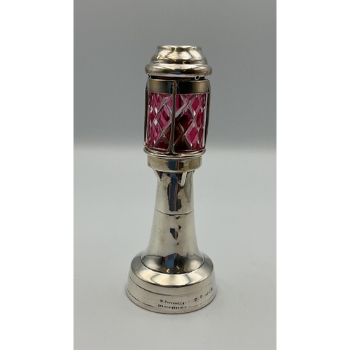 109 - A silver & red glass novelty lighthouse table lighter, Grey & Co, Chester, 1911, stamped retailers m... 