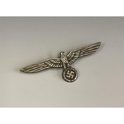 145 - German WWII type Kriegsmarine metal breast eagle, marked 'A' verso.,