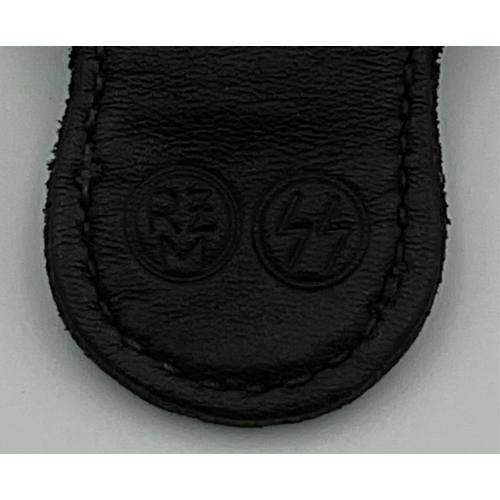 56 - German Third Reich SS dagger vertical hanger clip, good scarce black leather example impressed with ... 