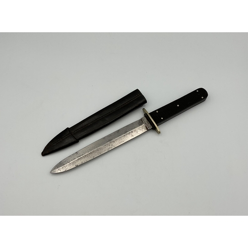 79 - A Victorian hunting knife by J. Hall (Bradford), 17.5 steel blade, two piece chequered grip, overall... 