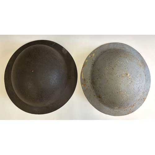 154 - A British Brodie Army Steel WWI London Brigade Helmet, with hand painted insignia, interior fittings... 