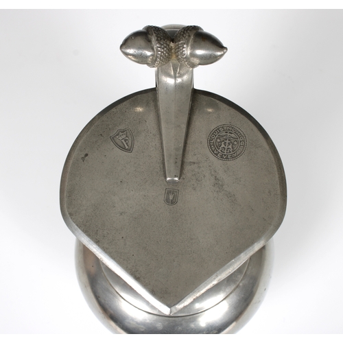 111 - A Swiss pewter lidded flagon by Louis Moriggi, Vevey, with acorn finials to handle, 1930's, marked t... 