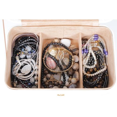 25 - A collection of costume jewellery, including silver chains and earrings; a button pearl necklace, th... 