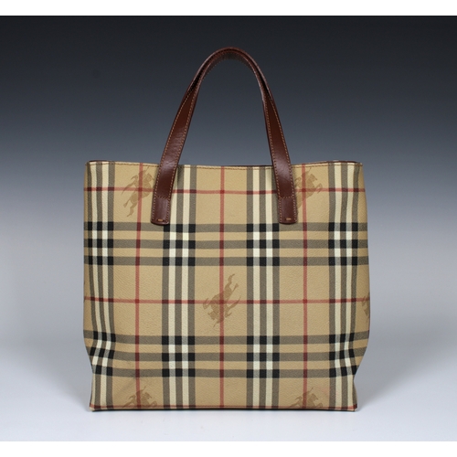 3 - A small Burberry tote bag, with dark brown Burberry lining and interior single zip, magnetic button ... 