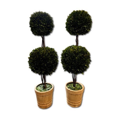 459 - A pair of double ball boxwood faux topiary trees, 132cm high.