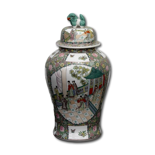 474 - A large 20th Century Chinese famille rose baluster vase, The cover surmounted with a foo dog, approx... 