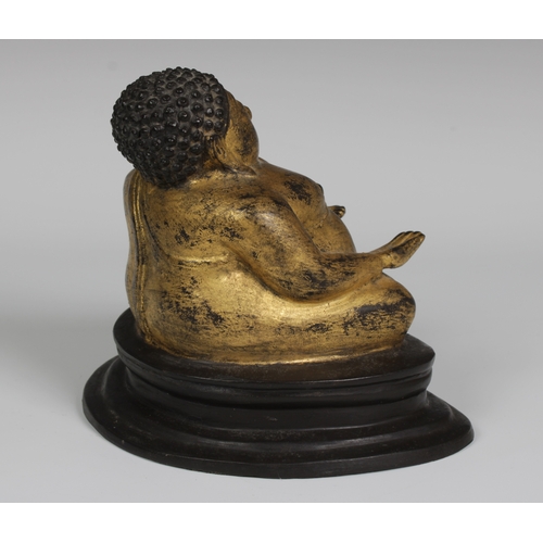 86 - A late 19th century Thai gilt bronze figure of Phra Sangkachai, Rattanakosin Kingdom, with integral ... 