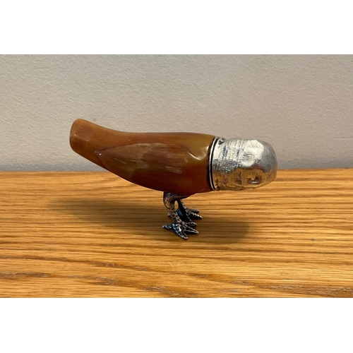 25 - A Victorian novelty silver mounted horn scent bottle, Maker's marks indistinct, London, 1879, modell... 