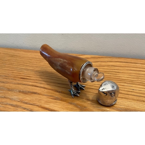 25 - A Victorian novelty silver mounted horn scent bottle, Maker's marks indistinct, London, 1879, modell... 