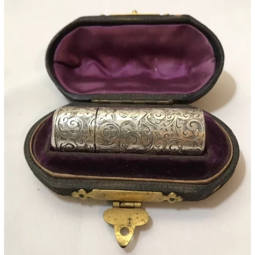 29 - A leather cased Victorian silver scent bottle, Horton Allday, Chester, 1876, of typical cylindrical ... 