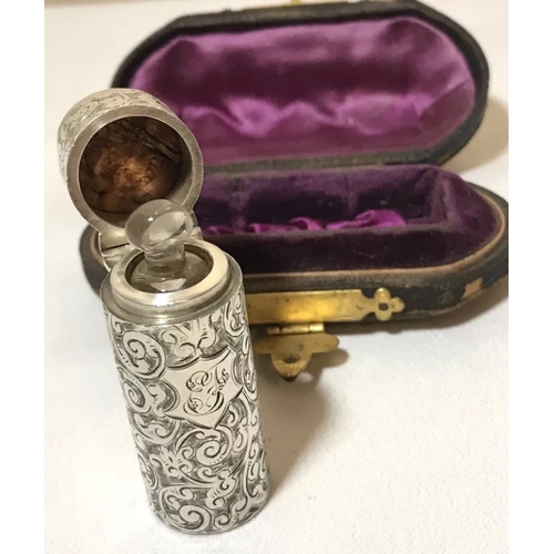 29 - A leather cased Victorian silver scent bottle, Horton Allday, Chester, 1876, of typical cylindrical ... 
