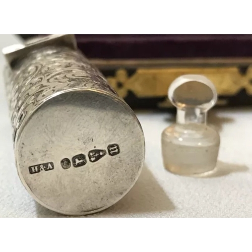 29 - A leather cased Victorian silver scent bottle, Horton Allday, Chester, 1876, of typical cylindrical ... 