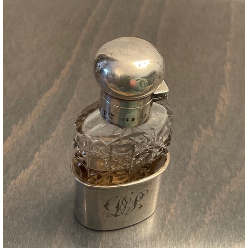 34 - A rare Continental novelty silver mounted cut glass scent bottle, Stamped 935 and other hallmarks, M... 
