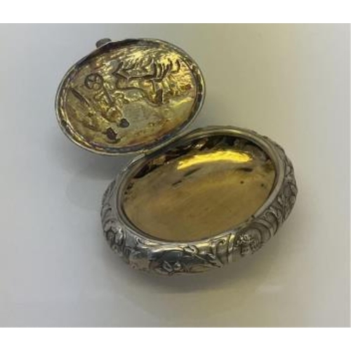 56 - An Edwardian silver oval pebble form snuff box, import marks for Cornelius Desormeaux Saunders & Jam... 