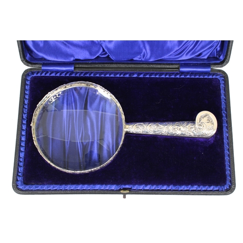12 - A fine Edwardian silver magnifying glass, in fitted case, Samuel Jacobs, London, 1908,  the 120mm. l... 
