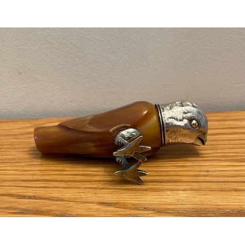 25 - A Victorian novelty silver mounted horn scent bottle, Maker's marks indistinct, London, 1879, modell... 