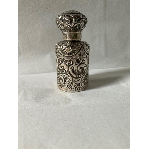 28 - A late Victorian silver scent bottle, Birmingham, 1899, maker's mark JHW, embossed with fern fronds ... 