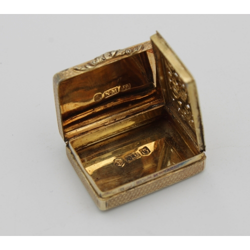 48 - A William IV silver-gilt rounded rectangular vinaigrette, Nathaniel Mills, Birmingham, 1830, engine-... 